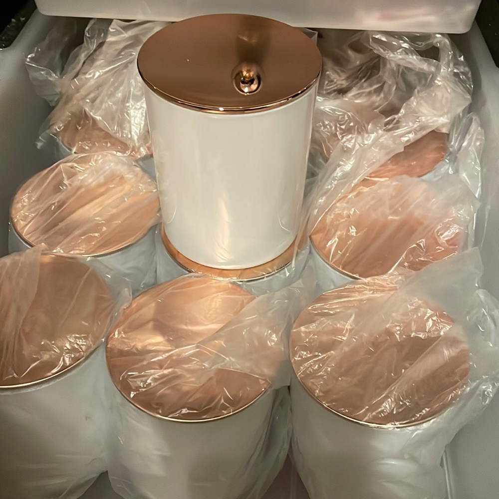 White glass with rose gold lid candle vessel